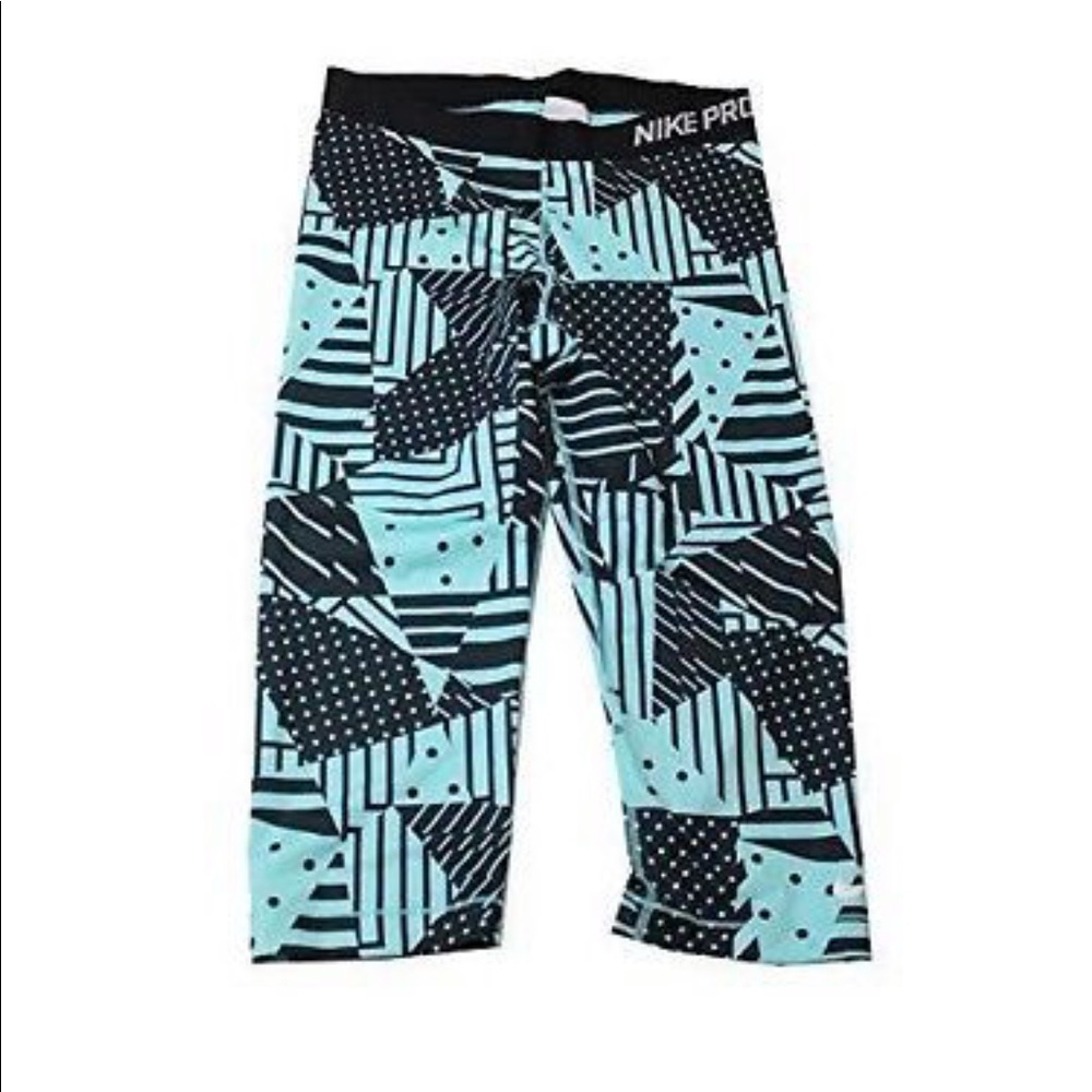 Blue and black Nike Pro Capri leggings
